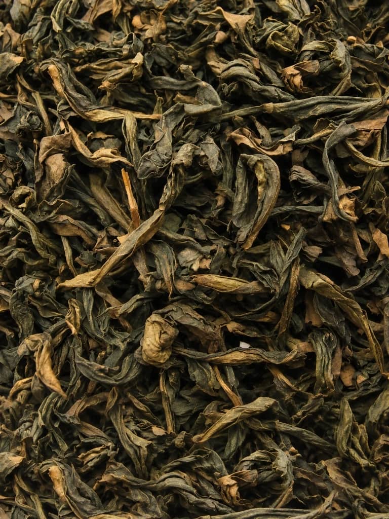 Dark twisted strip-style Rou Gui cliff tea leaves